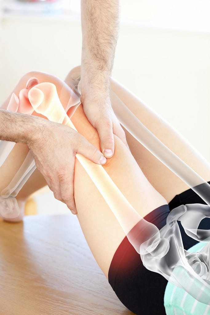 Digital composite of Highlighted bones of woman at physiotherapist